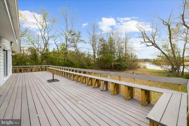a view of balcony with furniture