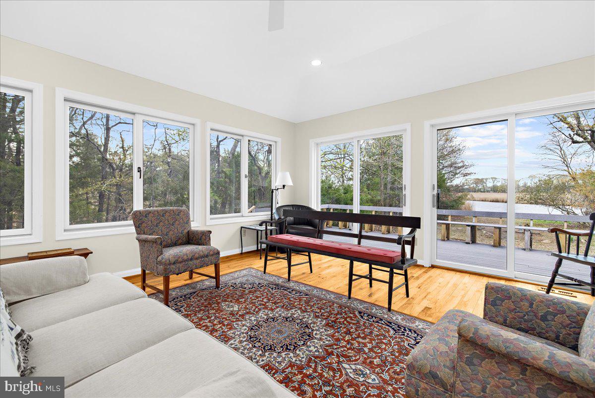 26889 Morgnec Road Chestertown, MD 21620 - Photo 2 of 32 a living room with furniture and a large window