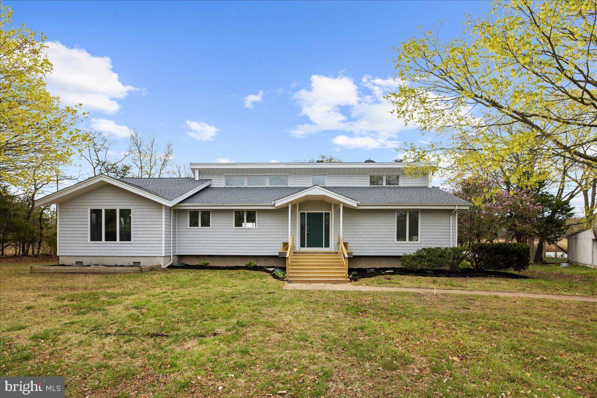 26889 Morgnec Road Chestertown, MD 21620 - Photo 30 of 32 a front view of a house with garden