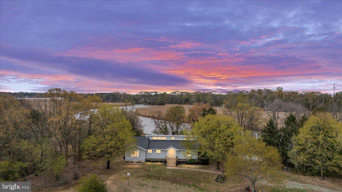 26889 Morgnec Road Chestertown, MD 21620 - Photo 7 of 32 a view of a lake in front of house