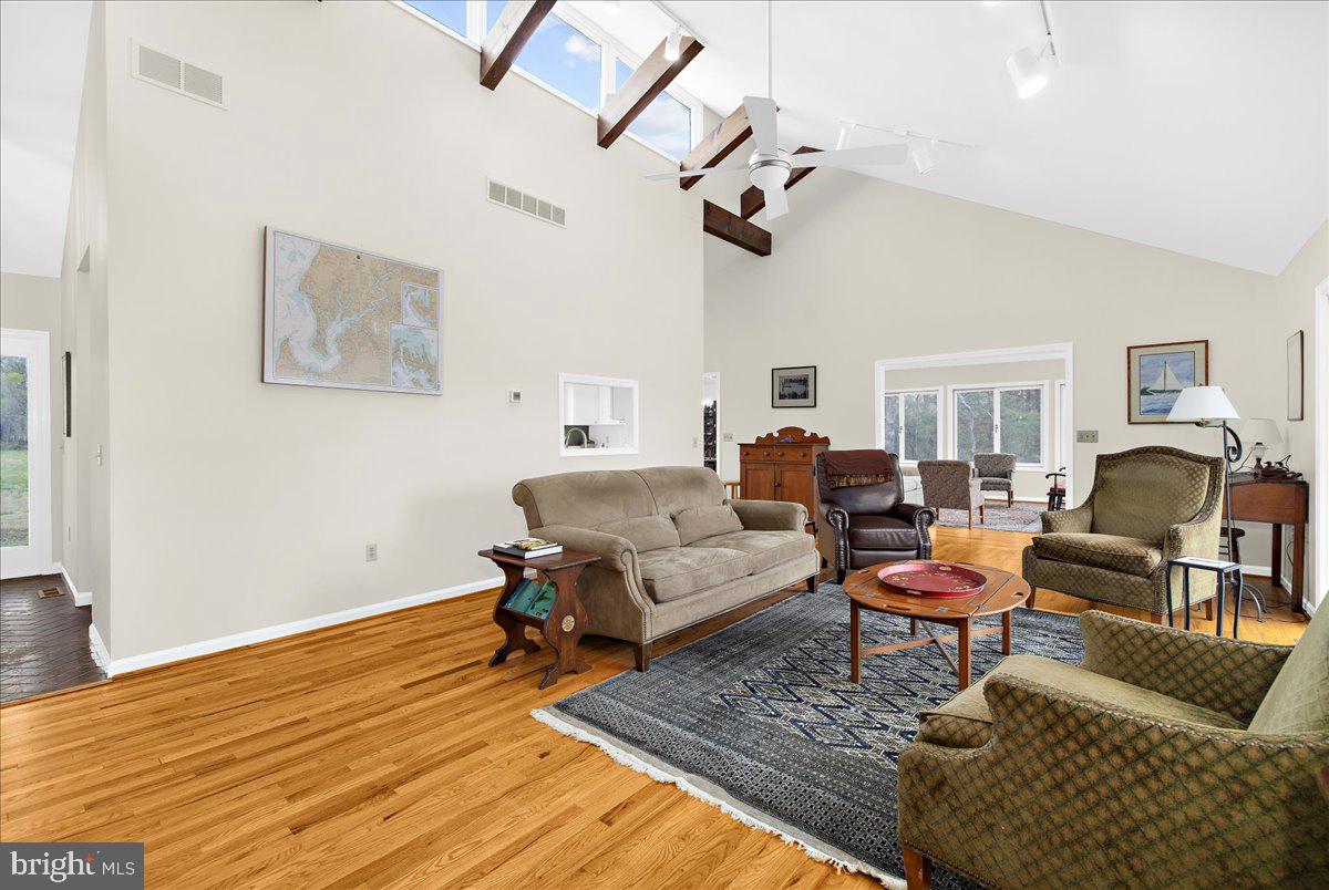 26889 Morgnec Road Chestertown, MD 21620 - Photo 10 of 32 a living room with furniture and wooden floor
