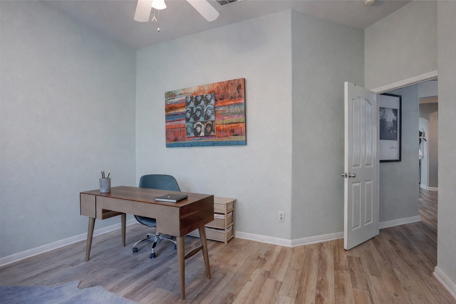2513 Wanakah Ridge Drive Cedar Park, TX 78613 - Photo 12 of 34 a view of a workspace with furniture and wooden floor