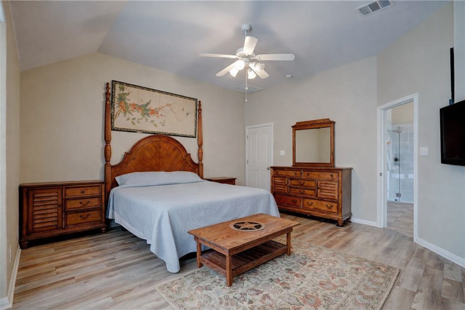 2513 Wanakah Ridge Drive Cedar Park, TX 78613 - Photo 20 of 34 a bedroom with a bed and dresser