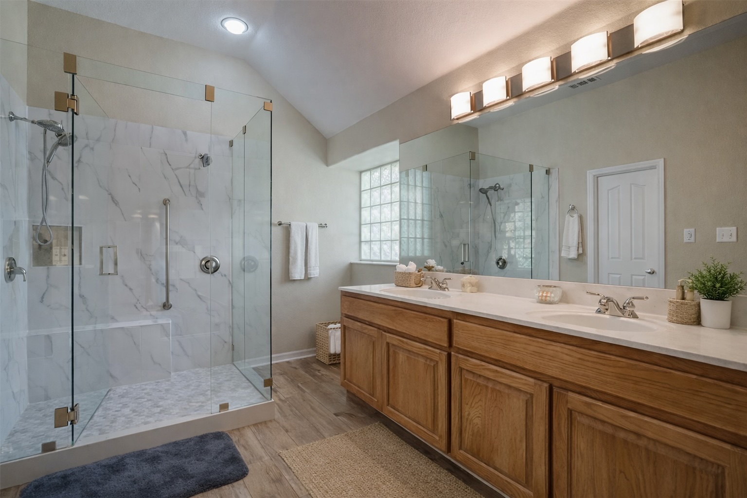 2513 Wanakah Ridge Drive Cedar Park, TX 78613 - Photo 24 of 34 a spacious bathroom with a shower sink and mirror