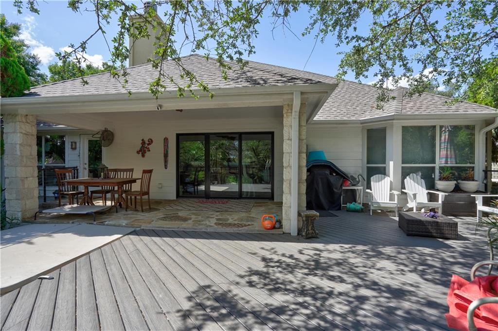2513 Wanakah Ridge Drive Cedar Park, TX 78613 - Photo 29 of 34 a view of a house with a barbeque grill and couches chairs