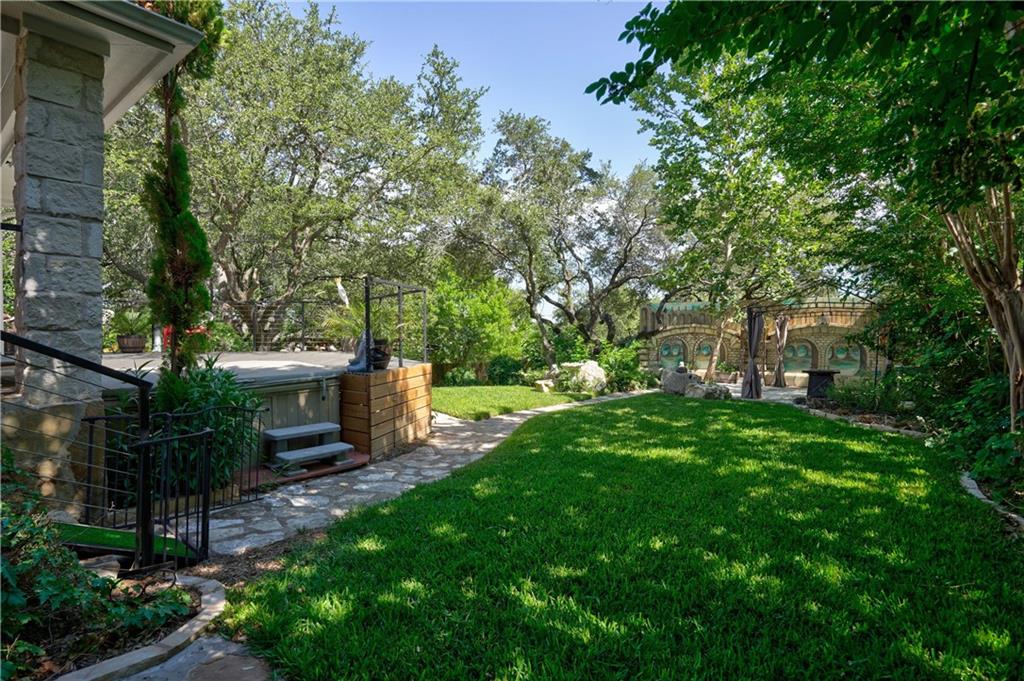 2513 Wanakah Ridge Drive Cedar Park, TX 78613 - Photo 31 of 34 a view of a chair and table in the garden
