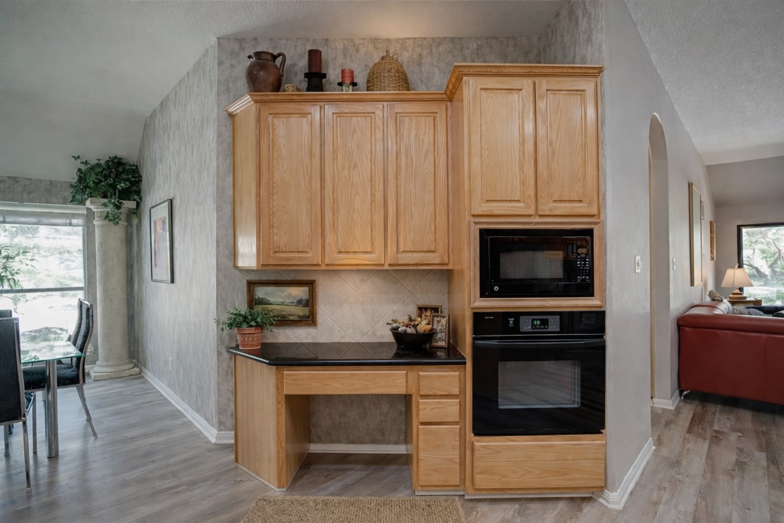 2513 Wanakah Ridge Drive Cedar Park, TX 78613 - Photo 8 of 34 a kitchen with stainless steel appliances granite countertop a stove microwave and cabinets