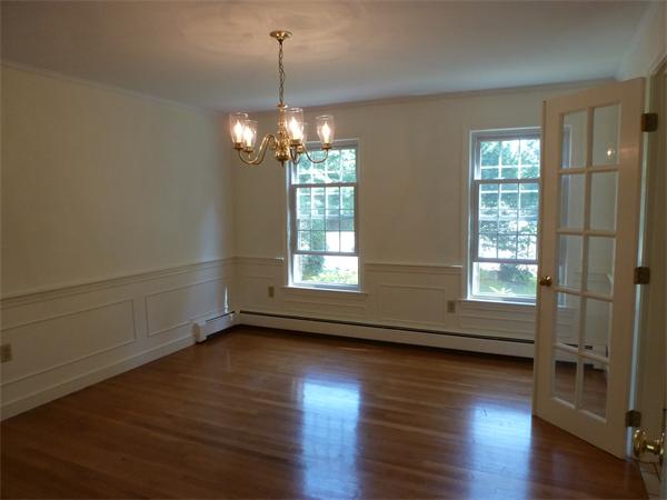 31 Phyllis Road Foxboro, MA 02035 - Photo 8 of 30 a view of an empty room with wooden floor and a window