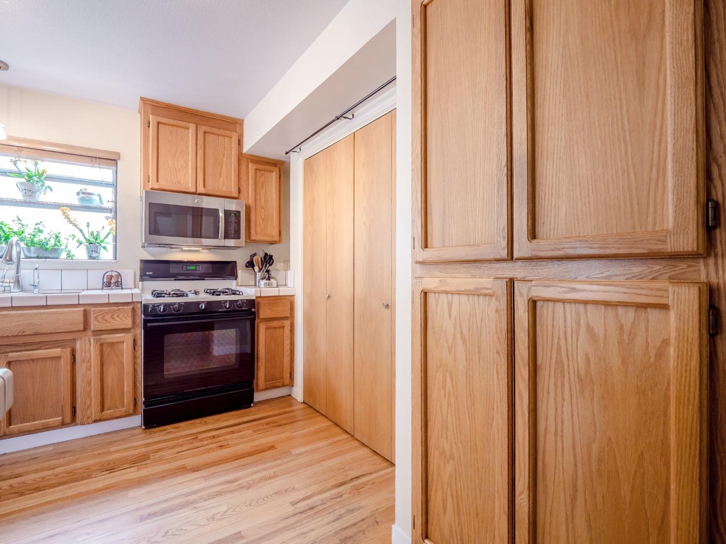 46 Sears Circle Soquel, CA 95073 - Photo 22 of 50 a kitchen with stainless steel appliances a stove and a refrigerator
