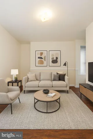 a living room with furniture and a couch