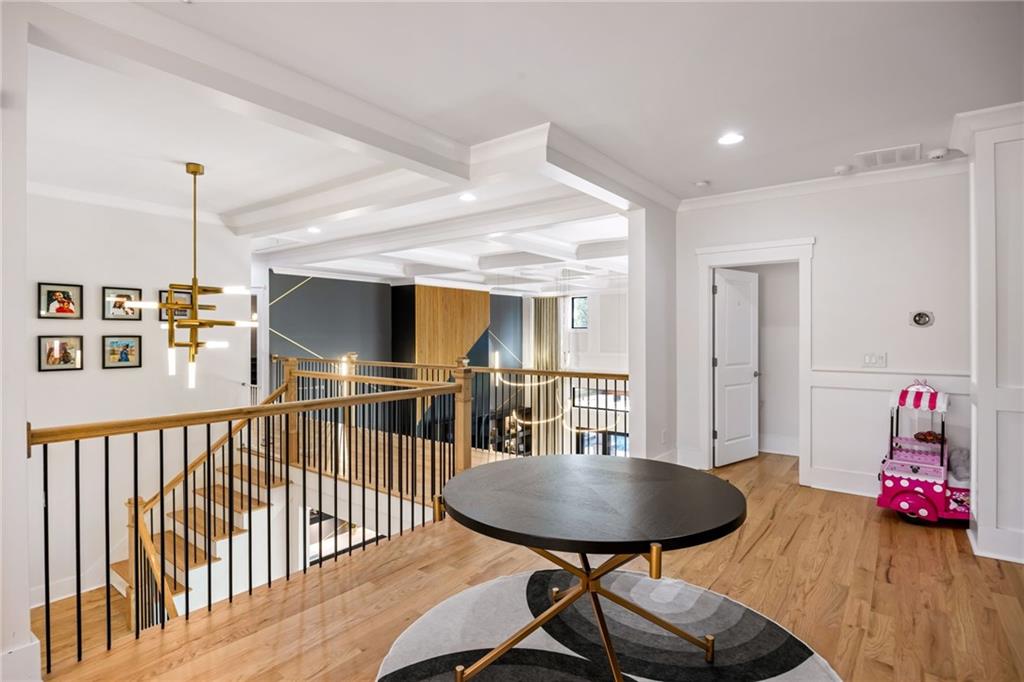 2641 Camp Branch Road Buford, GA 30519 - Photo 21 of 44 a view of a dining room with furniture and wooden floor