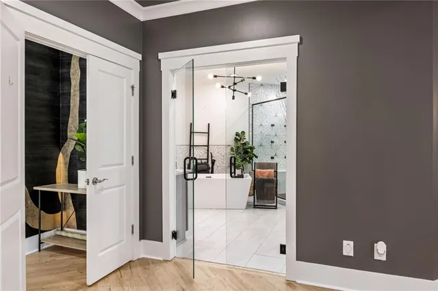 a bathroom with a bathtub and a shower