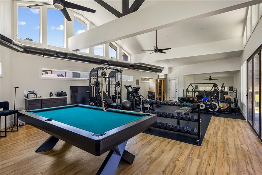 2641 Camp Branch Road Buford, GA 30519 - Photo 43 of 44 a living room with furniture pool table flat screen tv and a table