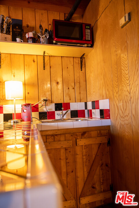 5212 Lone Pine Canyon Road Wrightwood, CA 92397 - Photo 25 of 42 a dining table with a large window