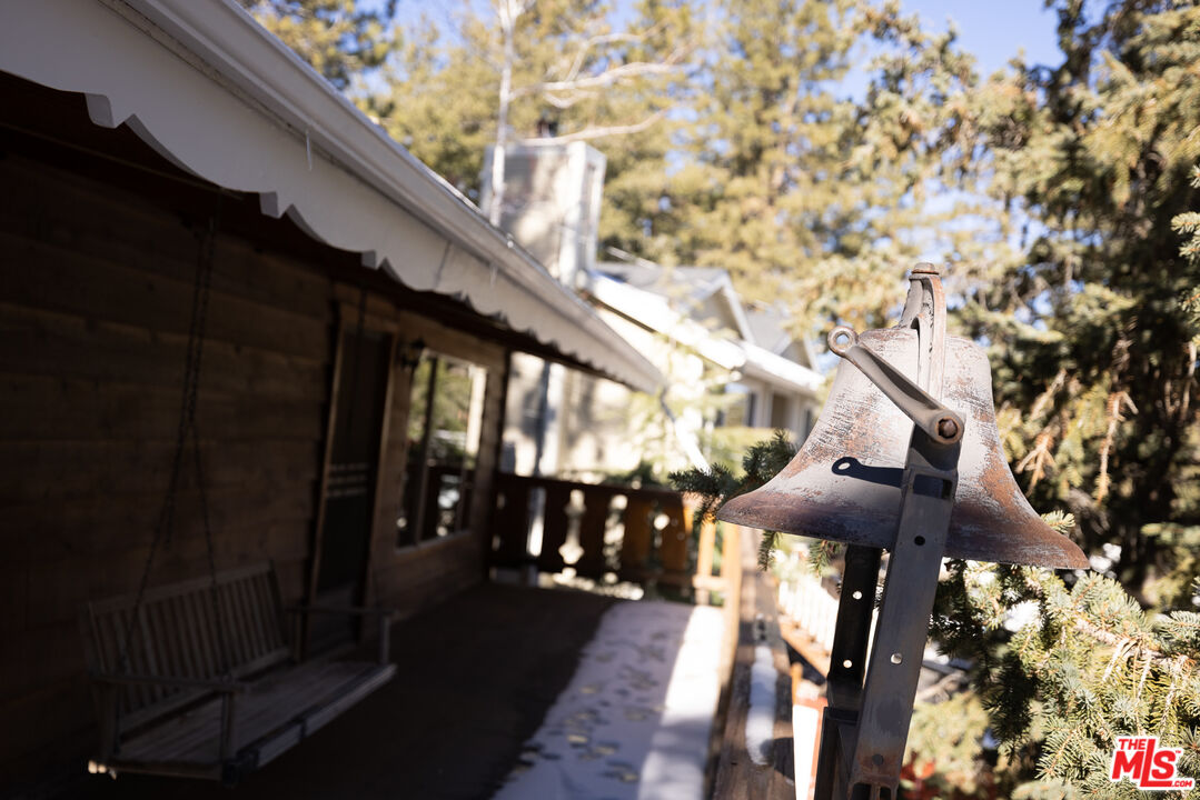 5212 Lone Pine Canyon Road Wrightwood, CA 92397 - Photo 36 of 42 a front view of a house with a yard