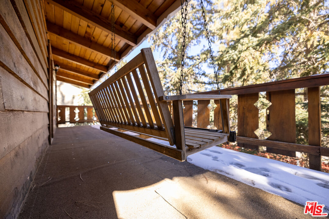 5212 Lone Pine Canyon Road Wrightwood, CA 92397 - Photo 39 of 42 a view of living room with balcony and furniture