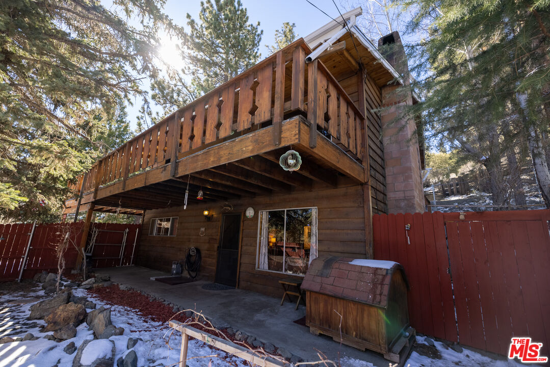 5212 Lone Pine Canyon Road Wrightwood, CA 92397 - Photo 41 of 42 a view of a house with a yard