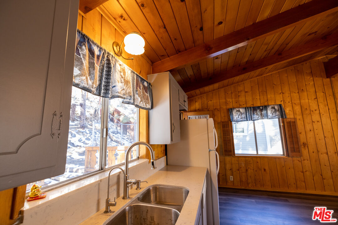 5212 Lone Pine Canyon Road Wrightwood, CA 92397 - Photo 9 of 42 a room with furniture and a window