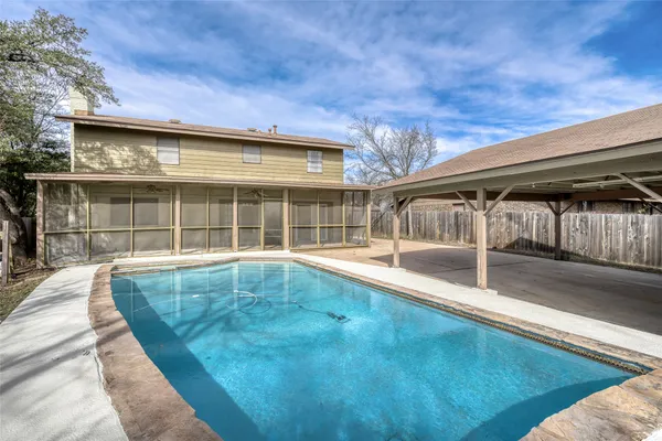 a view of a house with a swimming pool