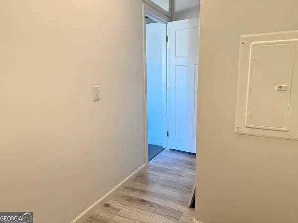 a view of an empty room with a window