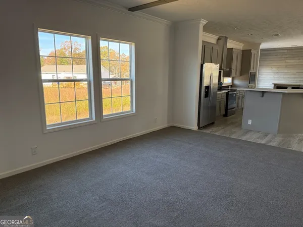 a view of a house with hallway and closet