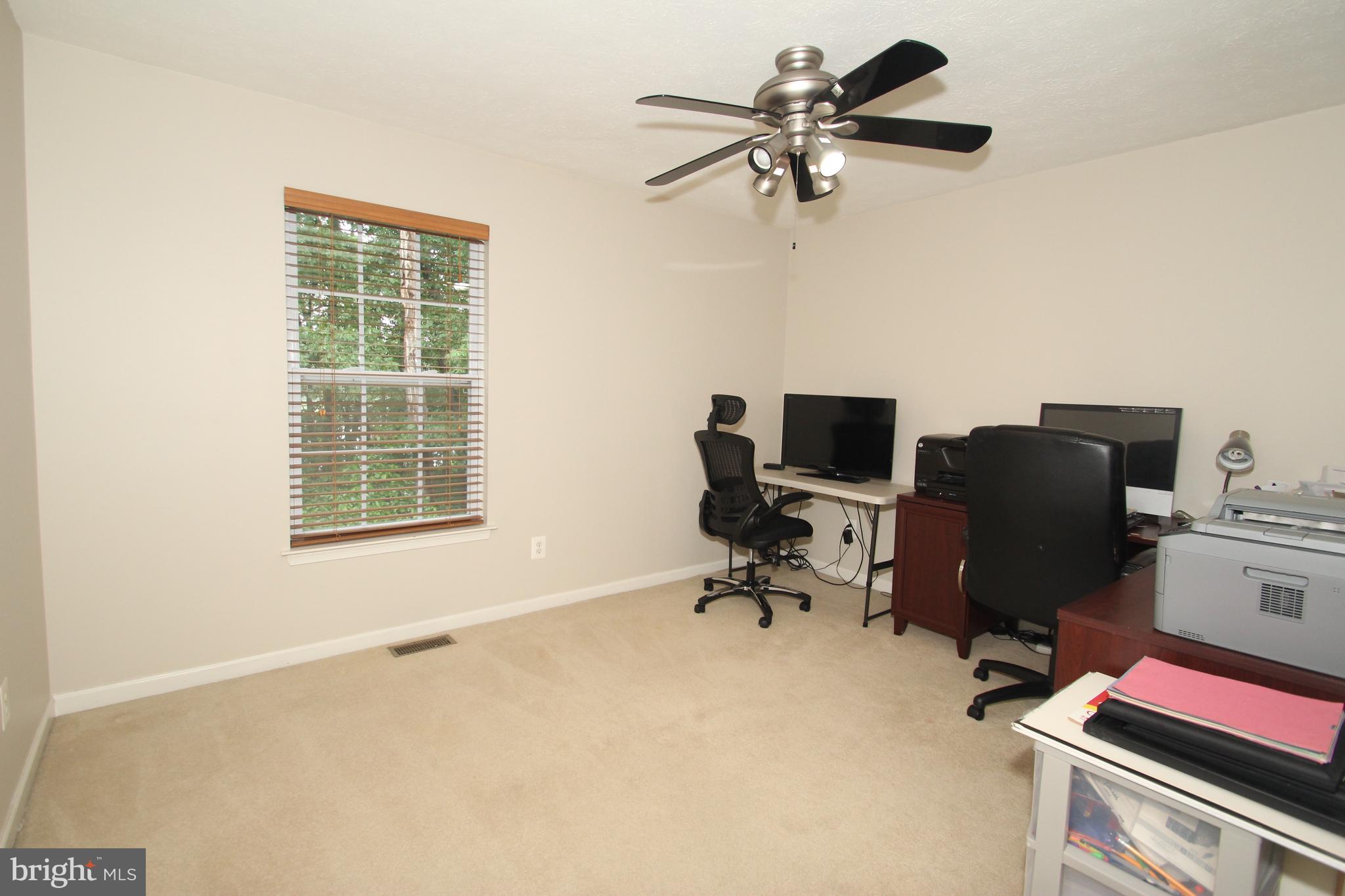 102 Patton Way Elkton, MD 21921 - Photo 18 of 27 a view of a workspace with furniture and a window