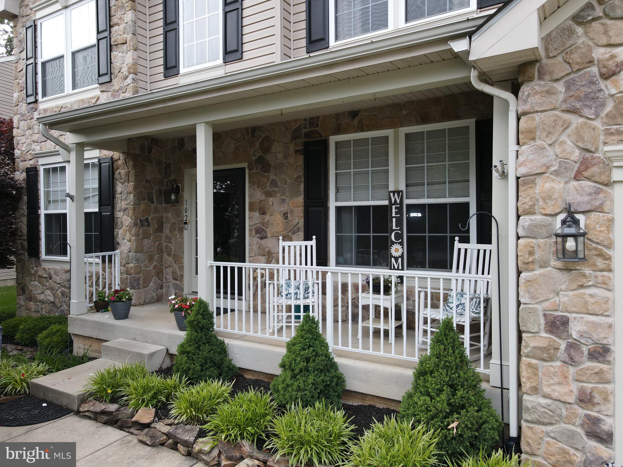 102 Patton Way Elkton, MD 21921 - Photo 2 of 27 a front view of a house with a porch