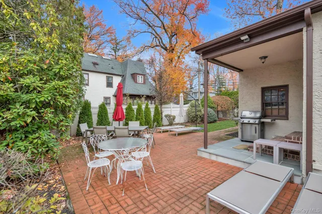 a view of a chairs and tables in the patio