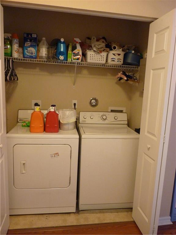 5298 Southeast Mitchell Lane Stuart, FL 34997 - Photo 26 of 33 a utility room with dryer and washer