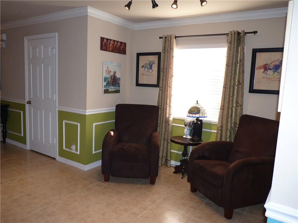 5298 Southeast Mitchell Lane Stuart, FL 34997 - Photo 4 of 33 a living room with furniture and a window