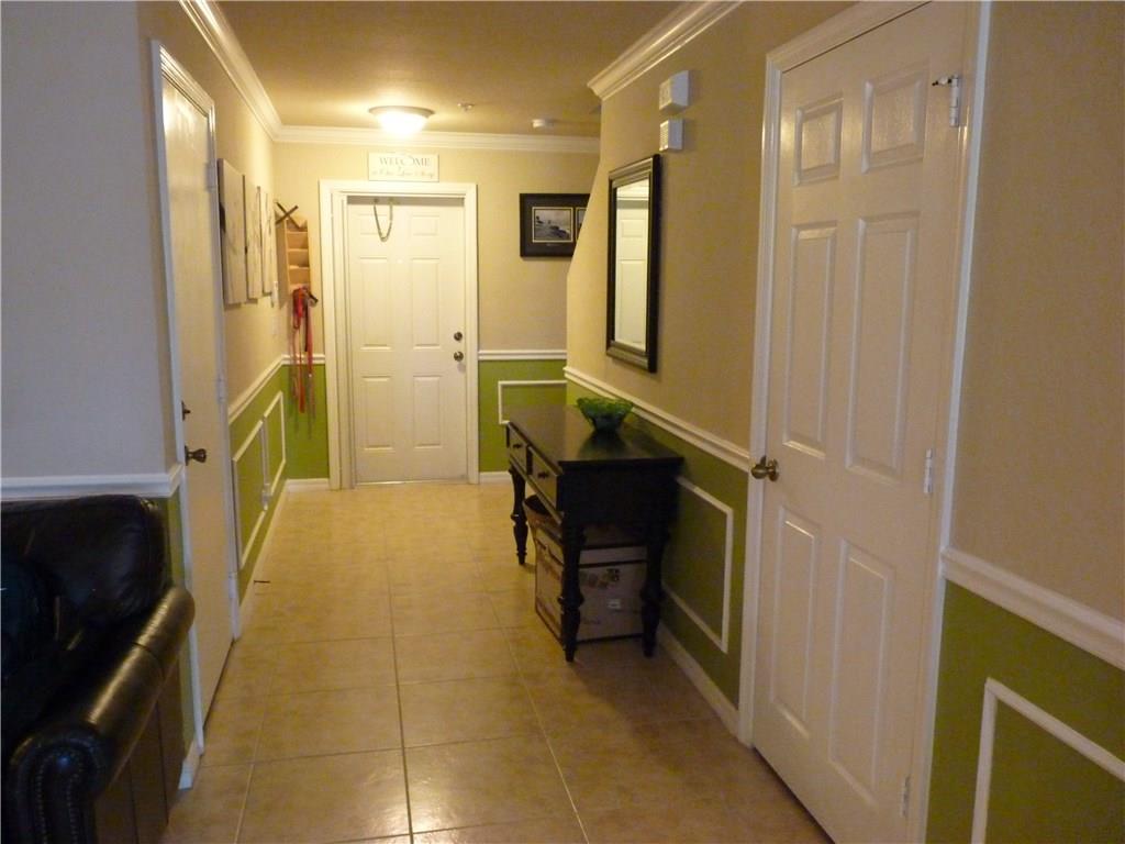 5298 Southeast Mitchell Lane Stuart, FL 34997 - Photo 5 of 33 a bathroom with a sink and a mirror