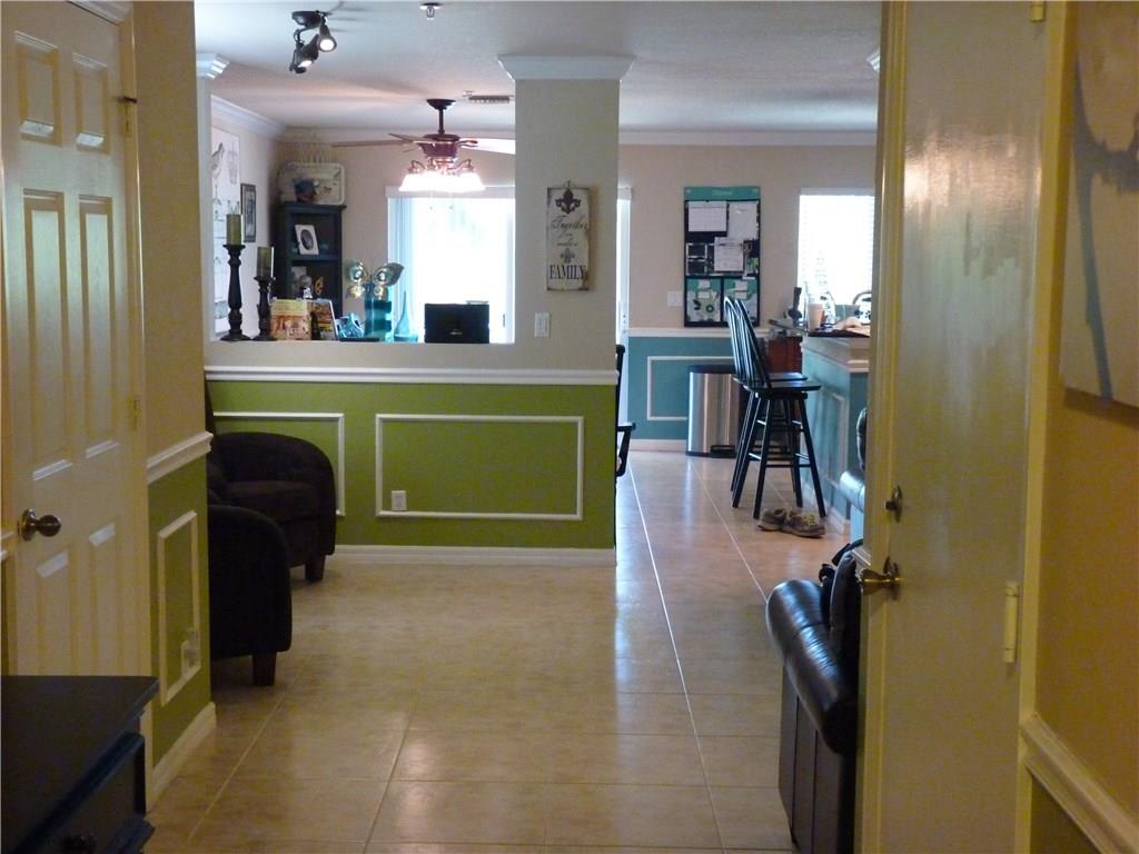 5298 Southeast Mitchell Lane Stuart, FL 34997 - Photo 6 of 33 a view of a living room and dining room