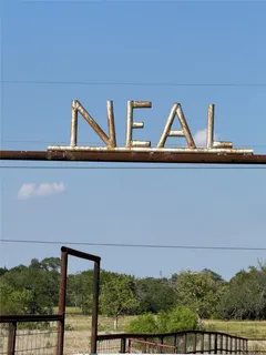 a view of two chairs and a table