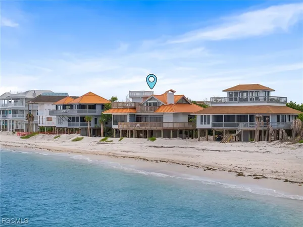 a front view of a building with a road