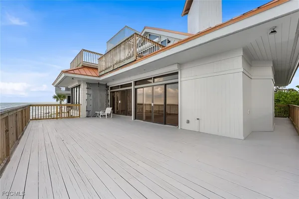 a view of a house with a roof deck