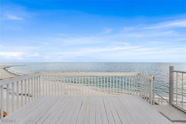 a view of terrace with wooden floor and fence