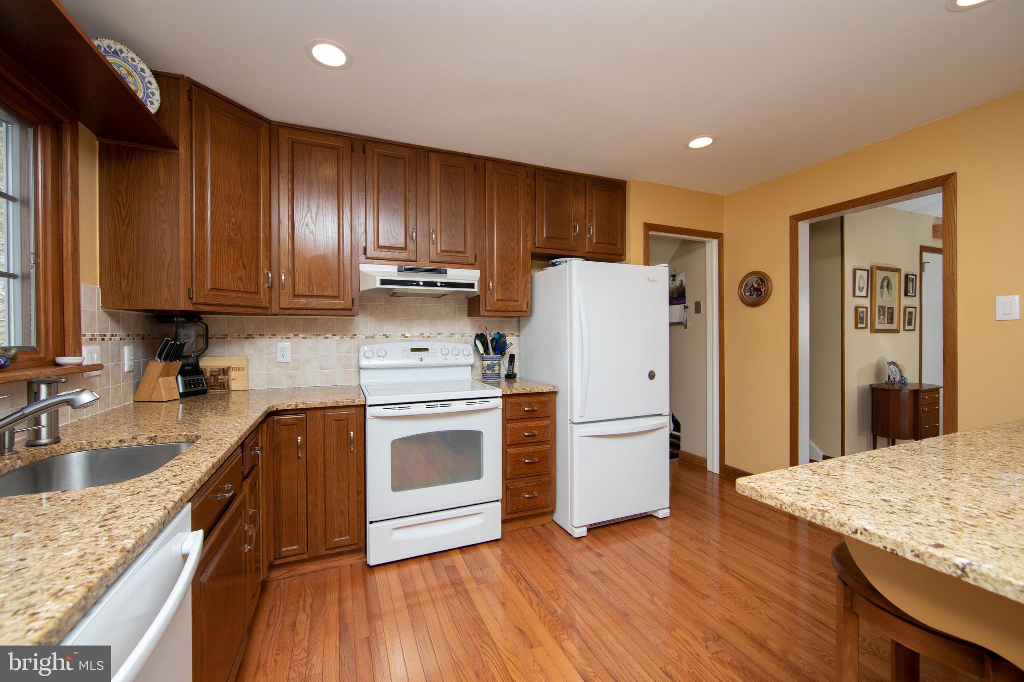 323 Sheffield Road Cherry Hill, NJ 08034 - Photo 9 of 31 42" wood cabinets with granite counters