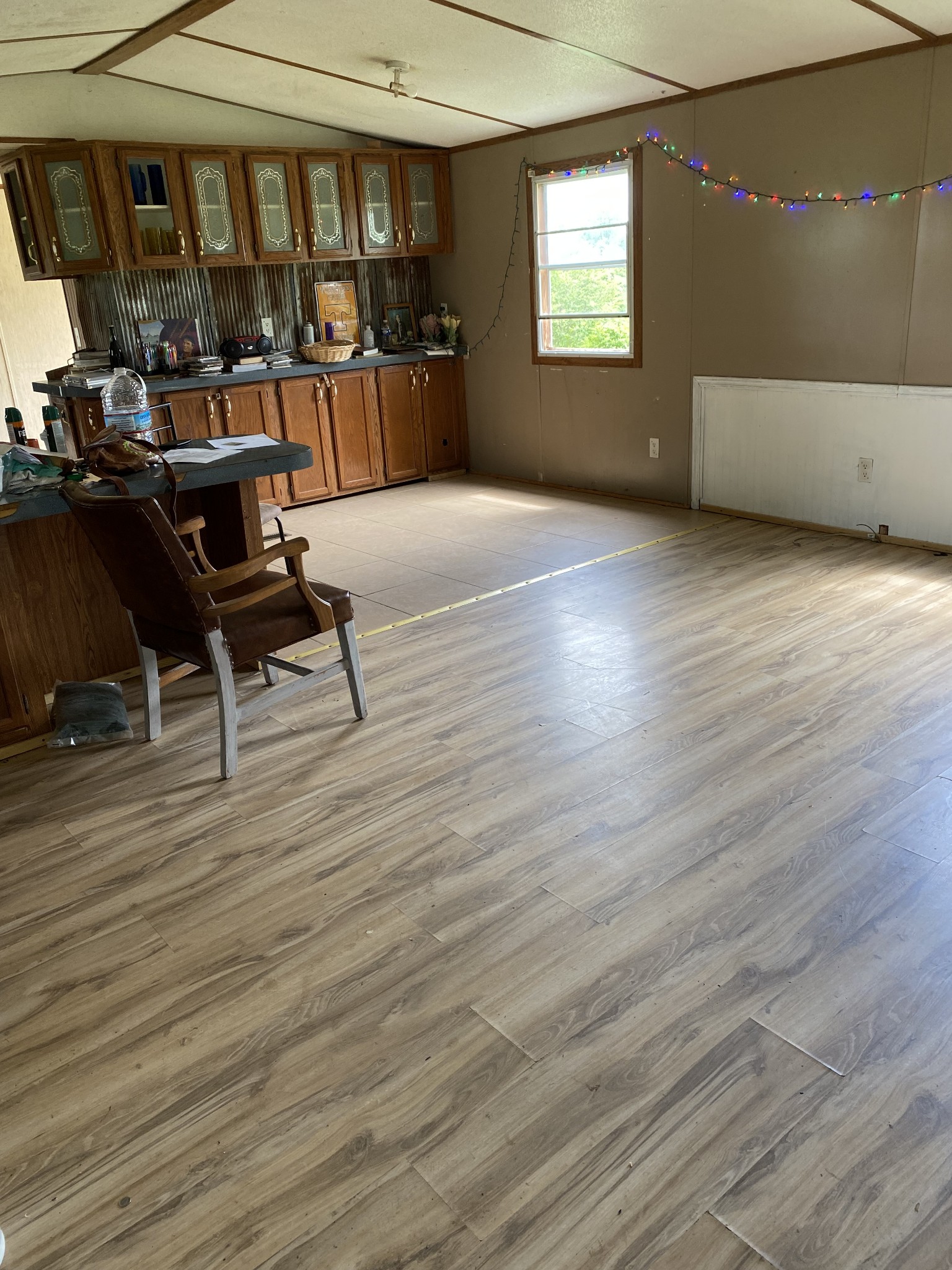 716 Calvert Ridge Road Westmoreland, TN 37186 - Photo 2 of 8 a view of an empty room with wooden floor and windows
