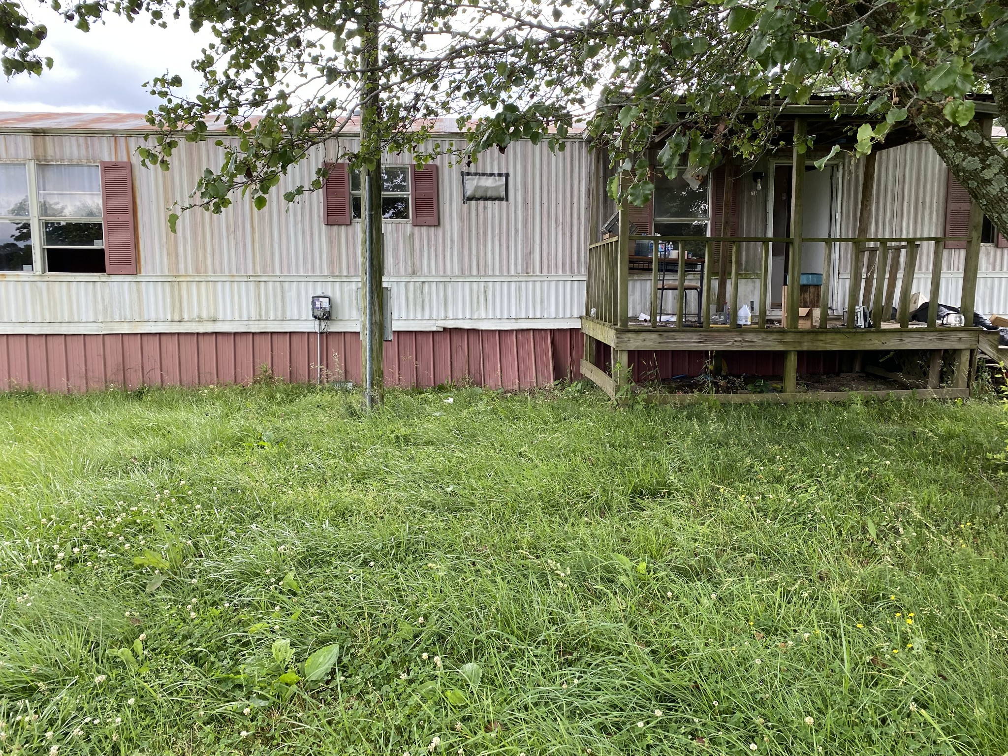 716 Calvert Ridge Road Westmoreland, TN 37186 - Photo 6 of 8 a view of backyard with wooden fence and large trees