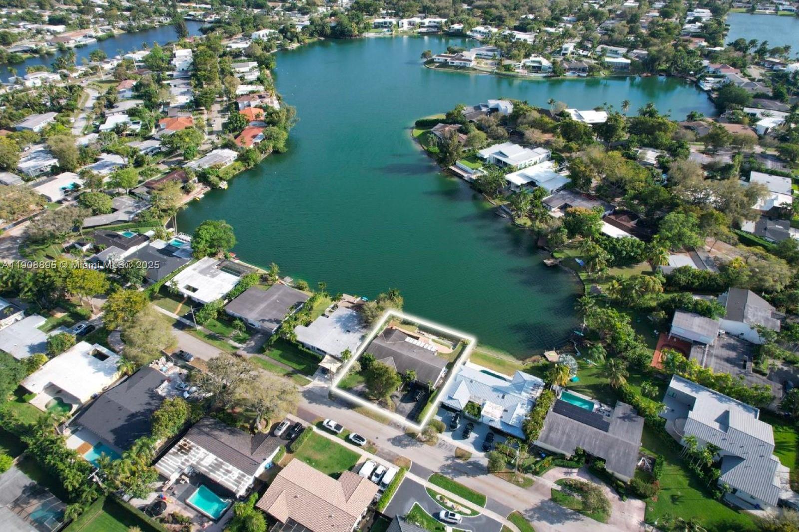 2010 Northeast 196th Terrace North Miami Beach, FL 33179 - Photo 19 of 26 an aerial view of a house with a lake view