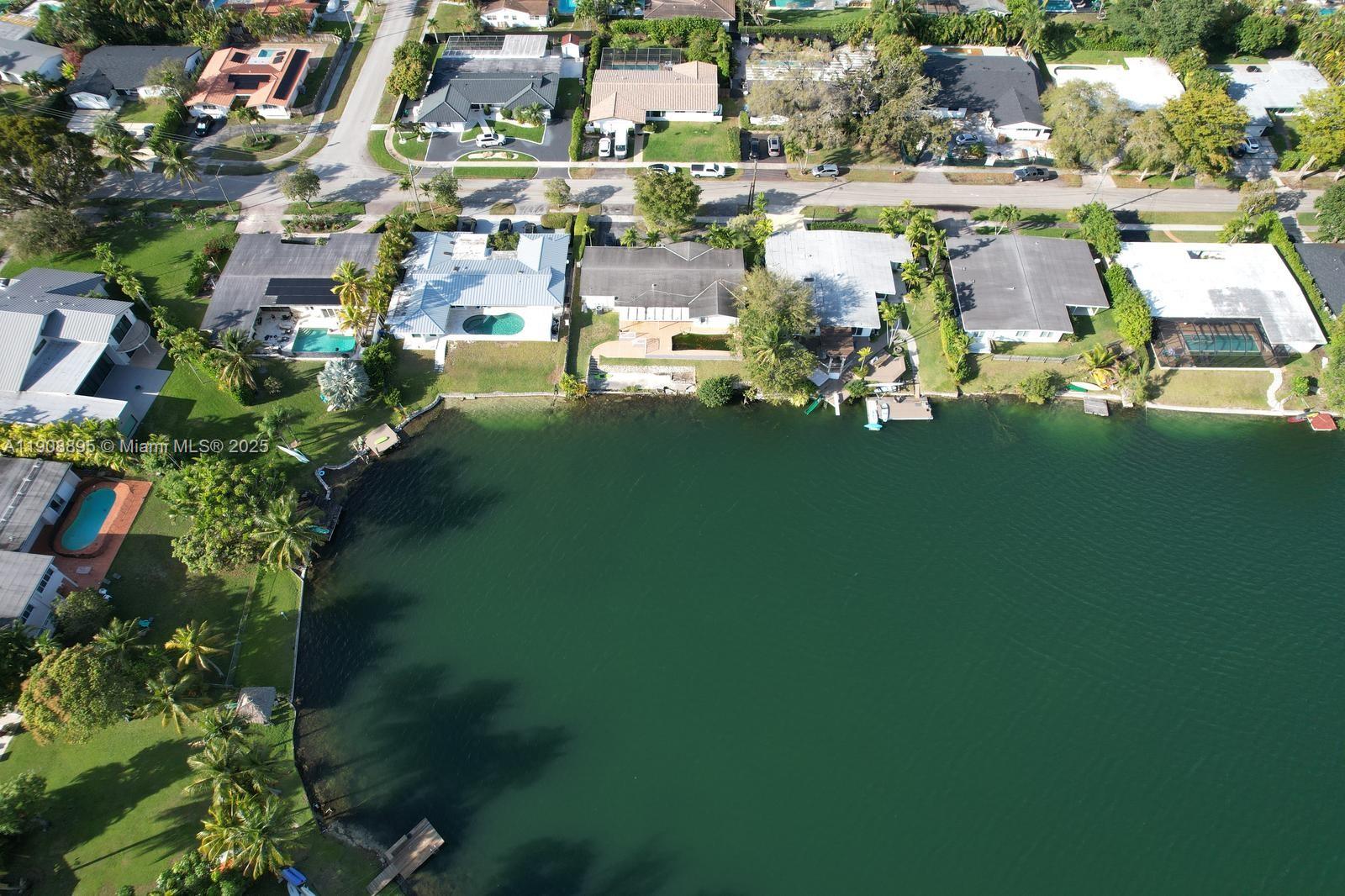 2010 Northeast 196th Terrace North Miami Beach, FL 33179 - Photo 23 of 26 a picture of houses with outdoor space