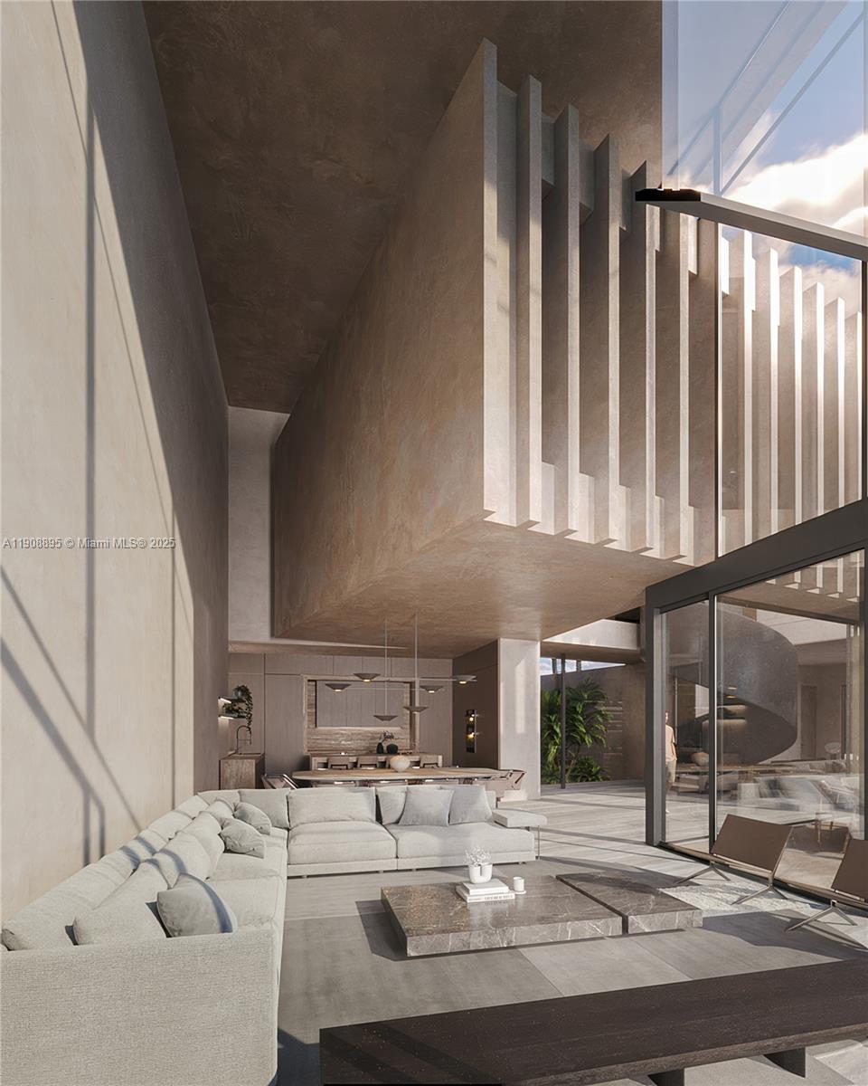 2010 Northeast 196th Terrace North Miami Beach, FL 33179 - Photo 4 of 26 a living room with furniture and a fireplace