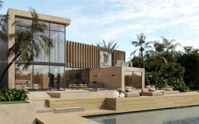 a view of a patio with a table and chairs under an umbrella