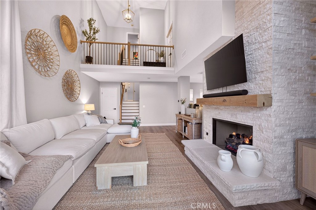 964 South Rim Crest Drive Anaheim, CA 92807 - Photo 17 of 69 a living room with furniture fireplace and flat screen tv