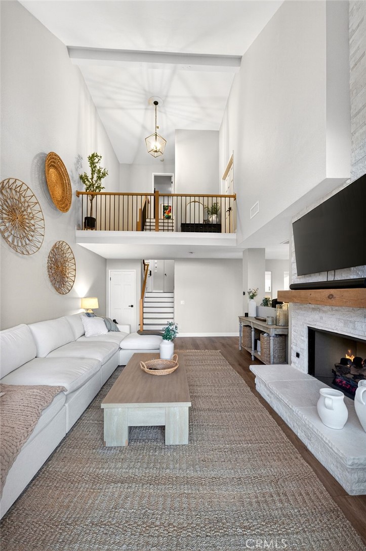 964 South Rim Crest Drive Anaheim, CA 92807 - Photo 18 of 69 a living room with fireplace furniture and a flat screen tv