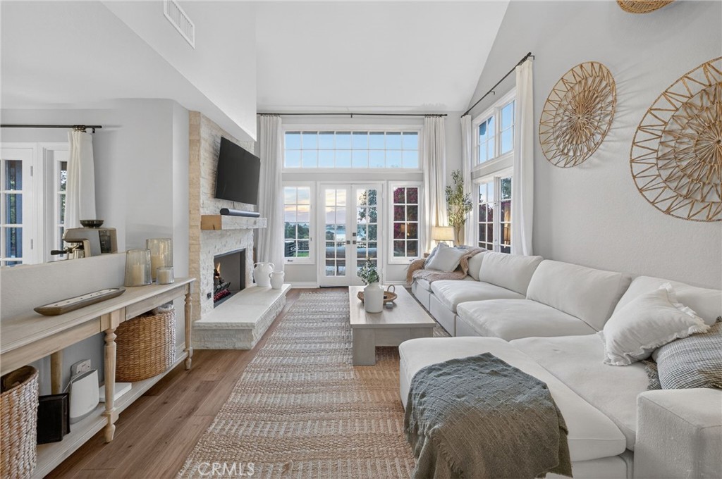 964 South Rim Crest Drive Anaheim, CA 92807 - Photo 20 of 69 a living room with furniture a flat screen tv and a fireplace