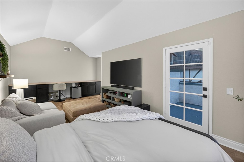 964 South Rim Crest Drive Anaheim, CA 92807 - Photo 50 of 69 a bedroom with furniture and a flat screen tv