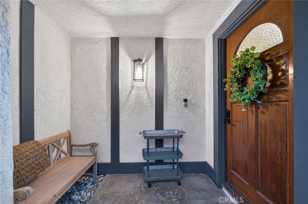 964 South Rim Crest Drive Anaheim, CA 92807 - Photo 59 of 69 a living room with furniture and a potted plant