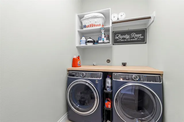 a view of washer and dryer in a utility room