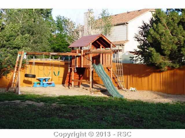 9065 Rutledge Drive Colorado Springs, CO 80920 - Photo 24 of 25 Included playground in the large back yard.